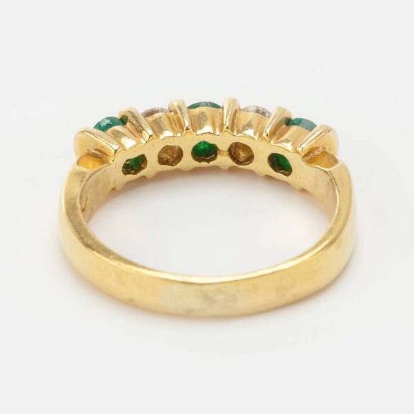 Fine Jewels of Harrogate Modern 0.25 Carat Emerald and 0.10 Diamond Five Stone Engagement Ring
