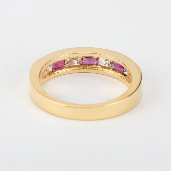 Fine Jewels of Harrogate Contemporary Gold 0.30 Carat Ruby and 0.35 Carat Diamond Seven Stone Half Eternity Ring