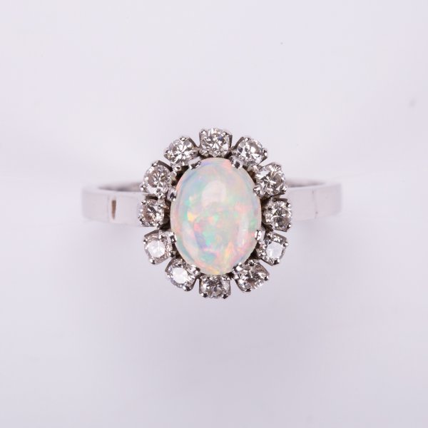 Fine Jewels of Harrogate Vintage 0.60 Carat Opal and 0.25 Carat Diamond Cluster Ring Circa 1950's