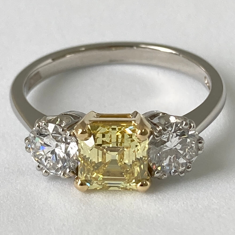Fine Jewels of Harrogate Contemporary 1.17 Carat Fancy Intense Yellow Asscher Cut Diamond Trilogy Three Stone Engagement Ring